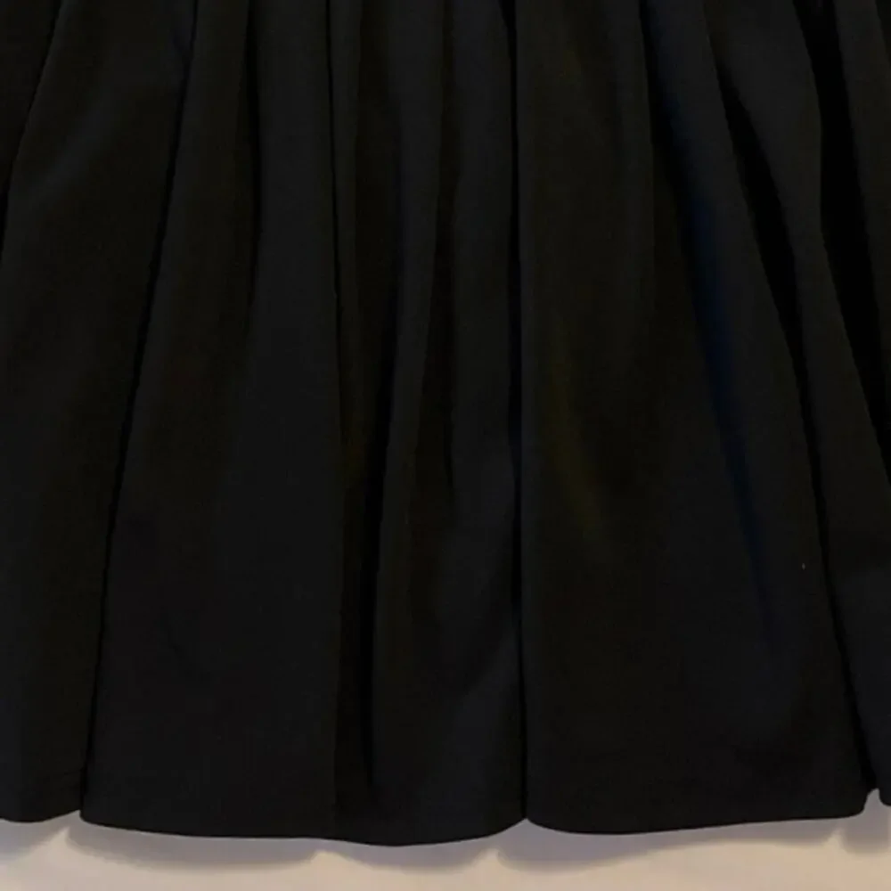 Indero Black Tennis Skort Womens Size L Pleated Feminine Pickleball Stretch Mini